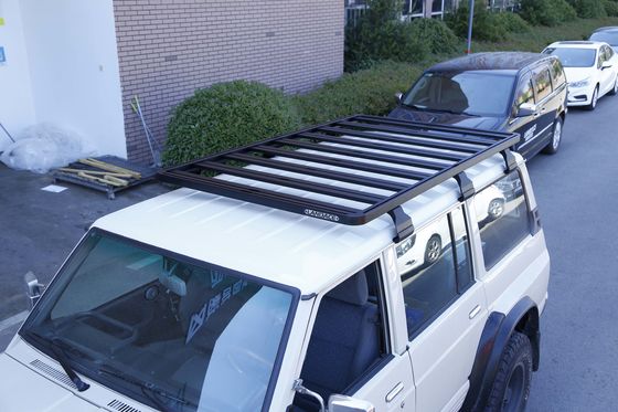 Nissan Van Car Roof Rack Instalación Negra de la lluvia Clampada de la canalita En el montaje