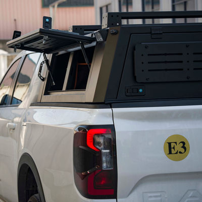 JMC DADAO 4x4 camioneta con techo de madera de color negro, con cubierta de polvo, camión camper, cama semi alta