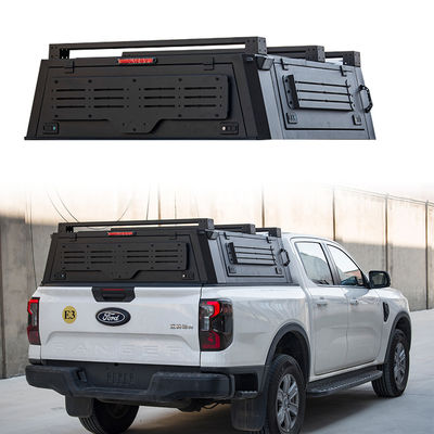 JMC DADAO 4x4 camioneta con techo de madera de color negro, con cubierta de polvo, camión camper, cama semi alta