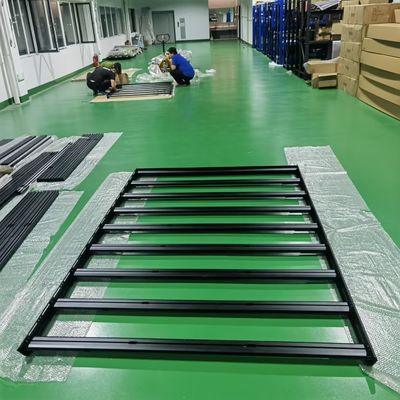 Plataforma de bastidores de techo de furgoneta personalizada en negro para actividades de campamento al aire libre